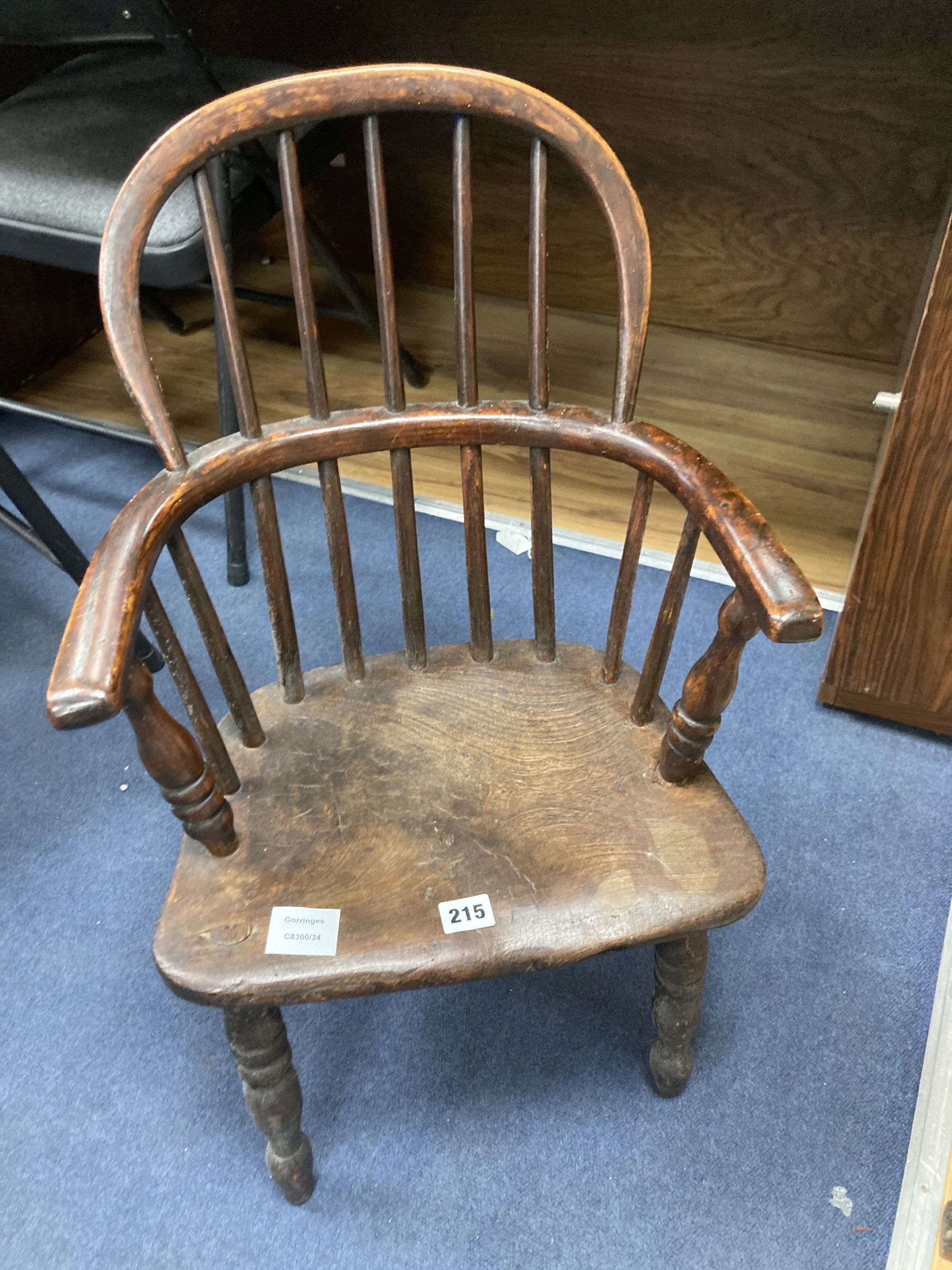 A 19th century elm and fruitwood childs Windsor elbow chair, width 40cm depth 30cm height 64cm